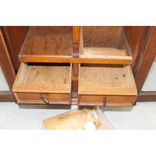 287 - A vintage oak tabletop cabinet with 4 small drawers