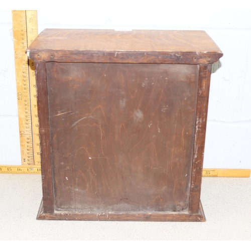 287 - A vintage oak tabletop cabinet with 4 small drawers