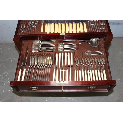 1002 - An extensive early 20th century Mappin & Webb canteen of cutlery in floor standing mahogany box