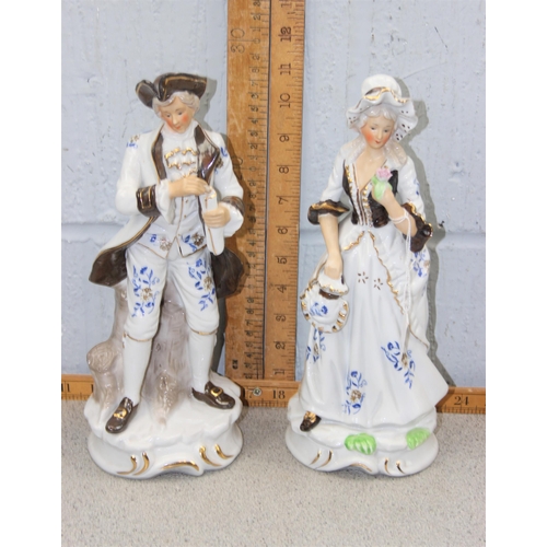 1760 - A pair of antique style porcelain figures