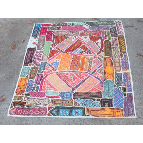 201 - A large Indian Banjara work mirrored wall hanging embroidery, approx 210cm x 160cm