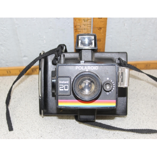 712 - Minolta X300 camera and a Polaroid Instant 20 camera (2)