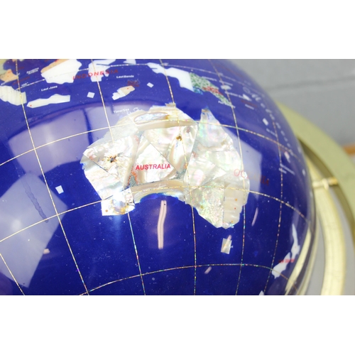 718 - A large gemstone globe on stand, approx 30cm diameter