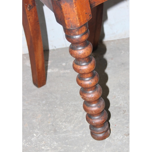 105 - 19th century oak hall chair with bobbin turned front legs