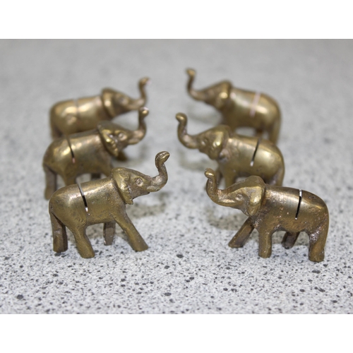 1633 - 6 bronze elephant name place holders, 6 elephant pickle forks & 6 Mirella rose flower menu holders