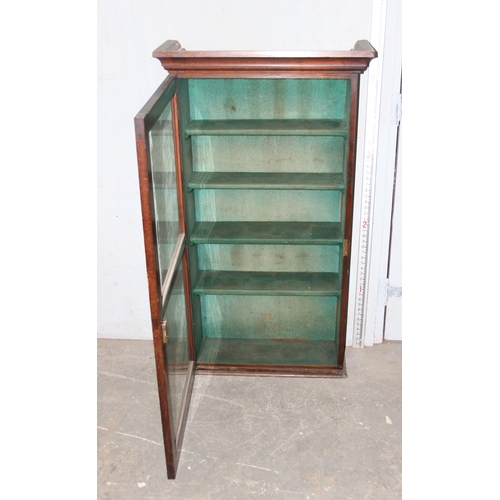 101 - An antique mahogany glazed display case or bookcase