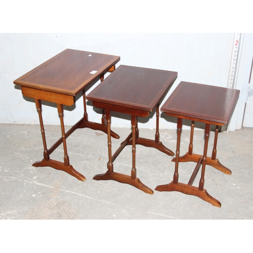 111 - Mahogany antique style nest of 3 tables