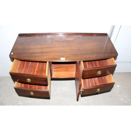 113 - A small vintage mahogany sideboard with 4 drawers and a cupboard