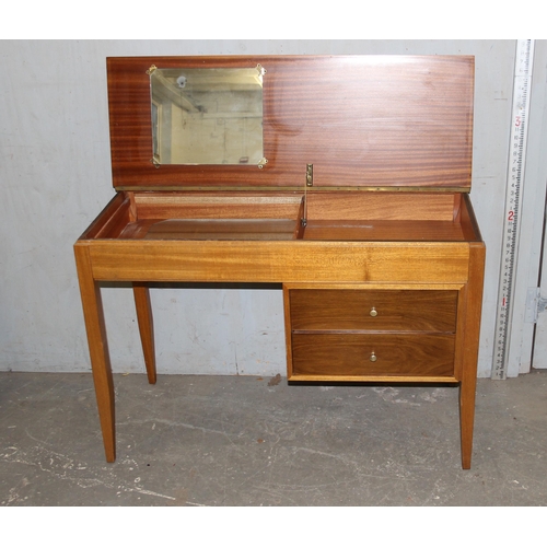 115 - A retro drawer desk or dressing table with lift up top, unmarked but to match previous lot