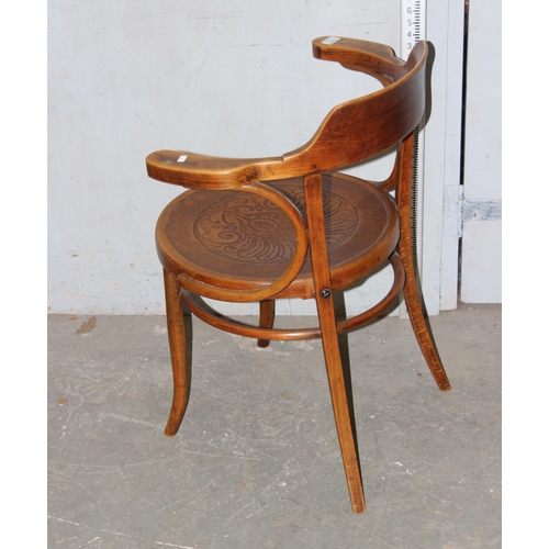 117 - A vintage Thonet style bentwood armchair with decorative seat