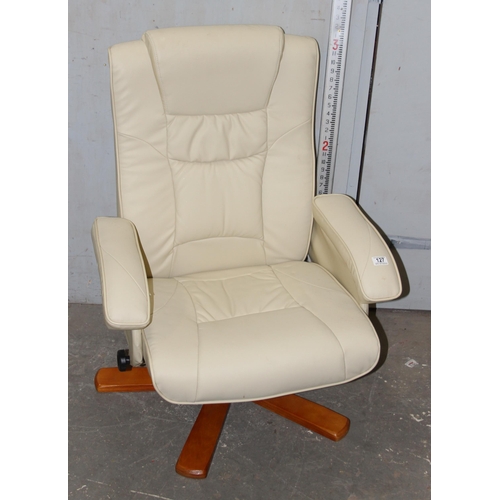 127 - An Ekornes style white leatherette easy chair with matching foot stool