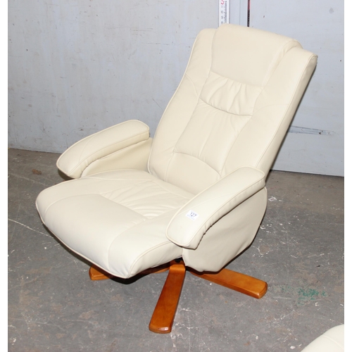 127 - An Ekornes style white leatherette easy chair with matching foot stool