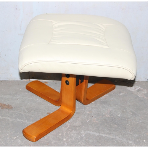 127 - An Ekornes style white leatherette easy chair with matching foot stool