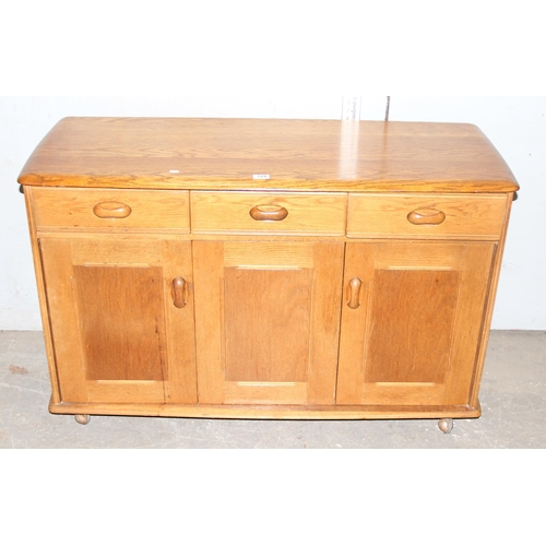 129 - Elm Ercol style 3 drawer sideboard