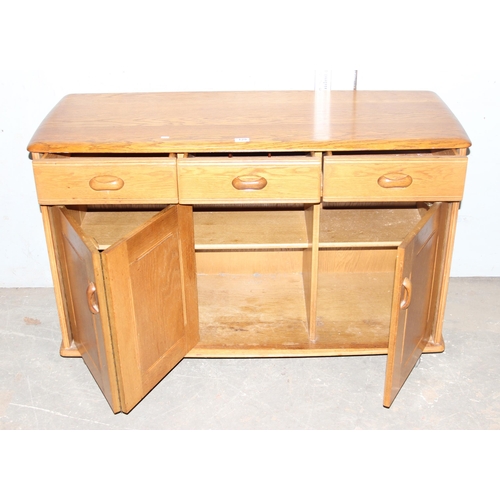 129 - Elm Ercol style 3 drawer sideboard