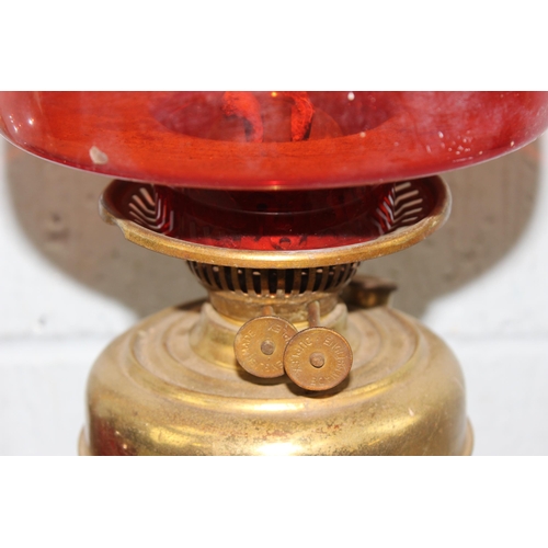 251 - 2 vintage brass and glass oil lamps