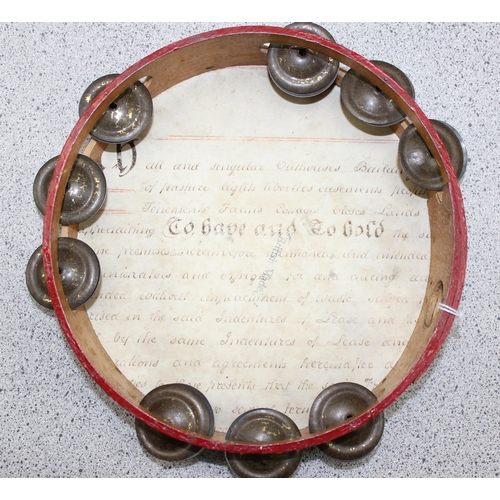 682 - An unusual vintage tambourine, the skin made from an antique legal document, believed to be a marria... 