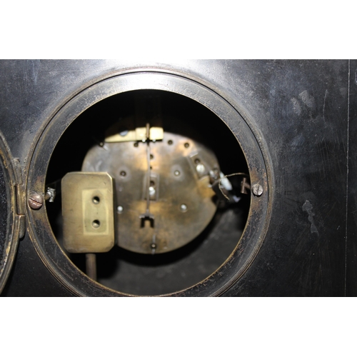 1318 - An antique slate cased mantel clock and another with wooden case and silvered dial (2)