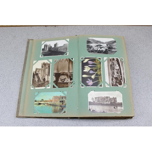 586 - Early 20th century postcard album and contents