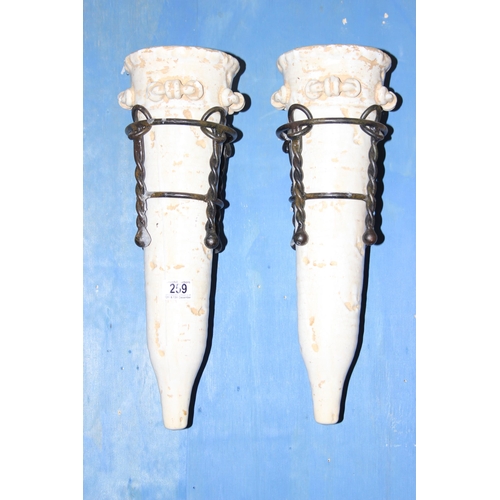 259 - A pair of vintage pottery and wrought iron wall bracket pockets, approx 50cm tall