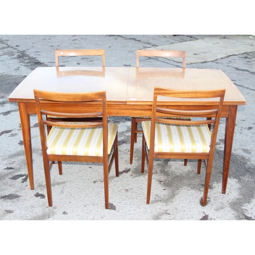 149 - G-plan style extending dining table and 4 upholstered dining chairs, the table unmarked but possibly... 