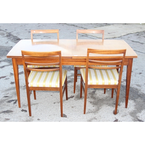 149 - G-plan style extending dining table and 4 upholstered dining chairs, the table unmarked but possibly... 