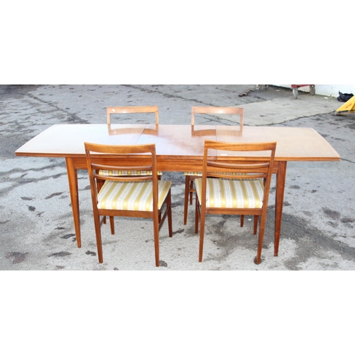 149 - G-plan style extending dining table and 4 upholstered dining chairs, the table unmarked but possibly... 