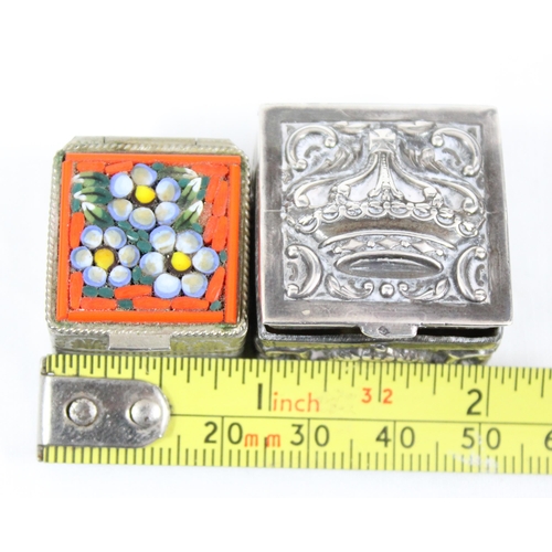 1010 - A small embossed silver pill box, import marks for London 1978 and another pill box with micromosaic... 