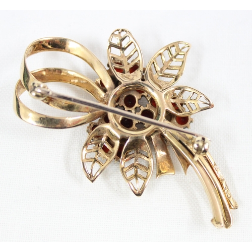 1122 - An impressive 9ct gold broch formed as flowers set with seed pearls and garnets, marked for London 1... 