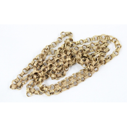 1131 - A long 9ct gold retro necklace made up of textured and plain ring links, import marks for Sheffield ... 