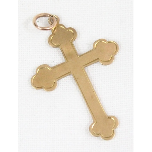 1132 - A 9ct gold crucifix pendant, approx 0.86g gross