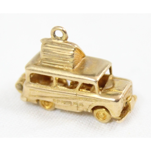 1135 - 9ct gold charm of a camper van with opening interior, Birmingham 1963, approx 4.44g gross