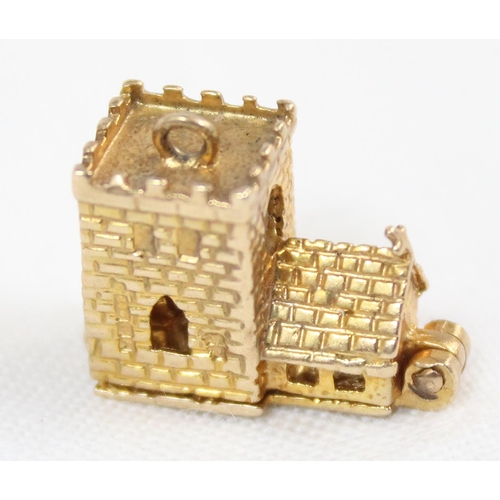 1137 - 9ct gold charm in the form of a church, opening to reveal a wedding scene, with Stanhope of the Lord... 