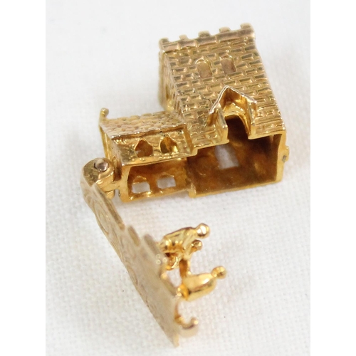 1137 - 9ct gold charm in the form of a church, opening to reveal a wedding scene, with Stanhope of the Lord... 