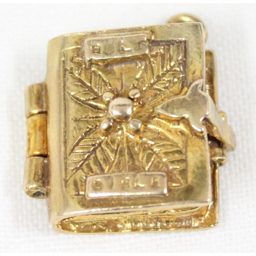 1139 - 9ct gold charm in the form of a bible opening to reveal Psalm 23, approx 5.58g gross