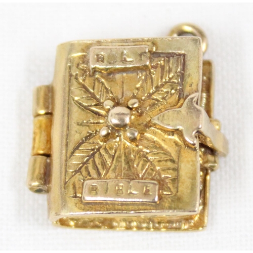 1139 - 9ct gold charm in the form of a bible opening to reveal Psalm 23, approx 5.58g gross