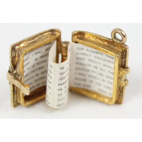 1139 - 9ct gold charm in the form of a bible opening to reveal Psalm 23, approx 5.58g gross