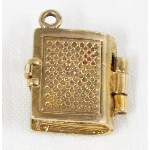 1139 - 9ct gold charm in the form of a bible opening to reveal Psalm 23, approx 5.58g gross