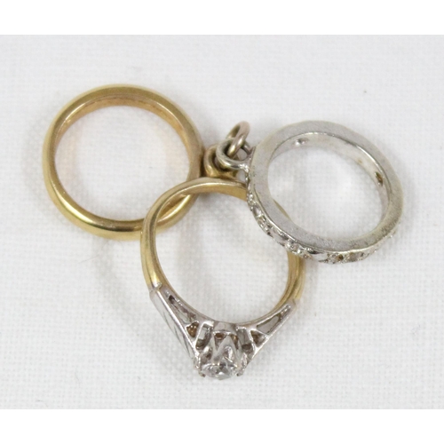 1144 - 9ct gold charm formed as 3 miniature rings, approx 2.91g gross