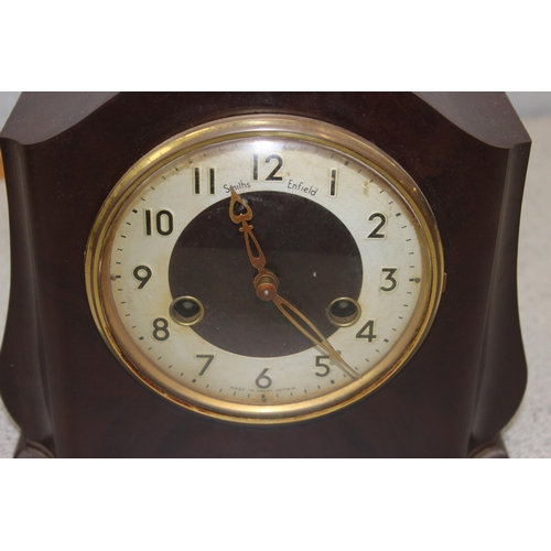 1332 - 2 Edwardian mantle clocks to include a Smiths Enfield Bakelite and a square faced oak cased example