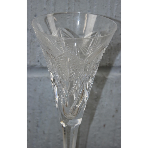 1689 - A pair of Waterford crystal glass toasting flutes with bow pattern, approx 23cm tall