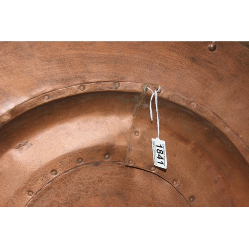 1841 - A large industrial style riveted copper wall charger, approx 80cm diameter