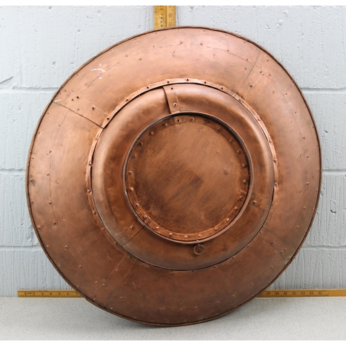 1841 - A large industrial style riveted copper wall charger, approx 80cm diameter