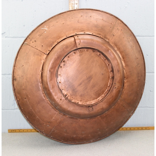 1841 - A large industrial style riveted copper wall charger, approx 80cm diameter