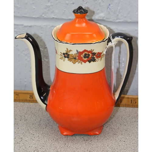 1847 - An Art Deco period orange, black and floral part coffee set by Wedgwood, Richelieu pattern