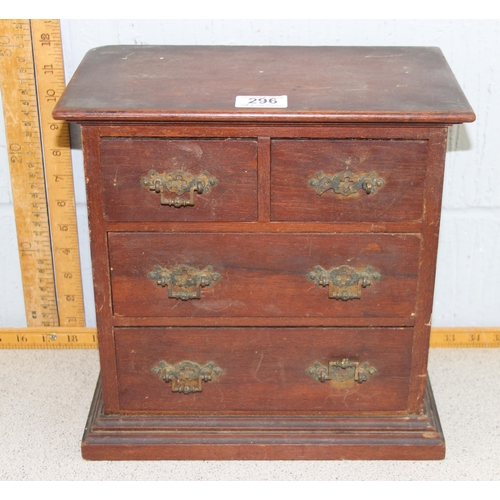 300 - An antique miniature 2 over 2 table top collector's chest of drawers