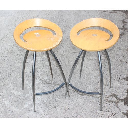 166 - A pair of Lyra Magis designer barstools