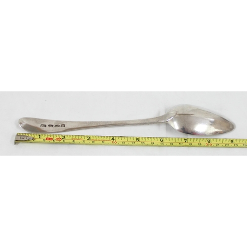 1074 - A large Irish silver serving spoon with bright cut decoration, Dublin 1800 by JS, approx 24cm long, ... 