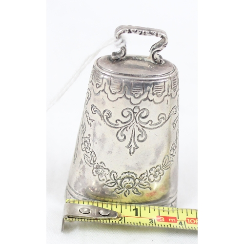 1084 - An unusual miniature silver cow bell with engraved decoration, unmarked but XRF tested approx 90% pu... 