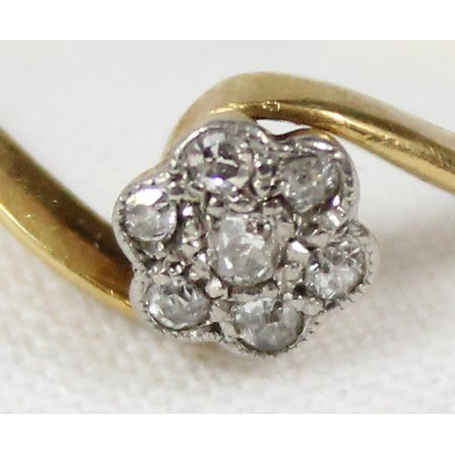 1165 - 18ct gold and diamond ring with a floral crossover setting, approx size N, approx 2.16g gross